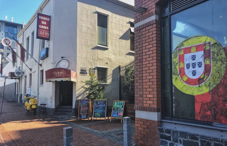 Alfred Street outside Vasco’s, with a Portuguese flag painted on the wall