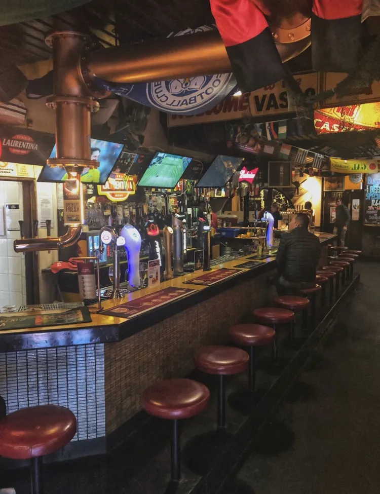 The long bar counter and stools